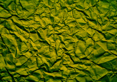 green Crumpled paper background, place for textの写真素材