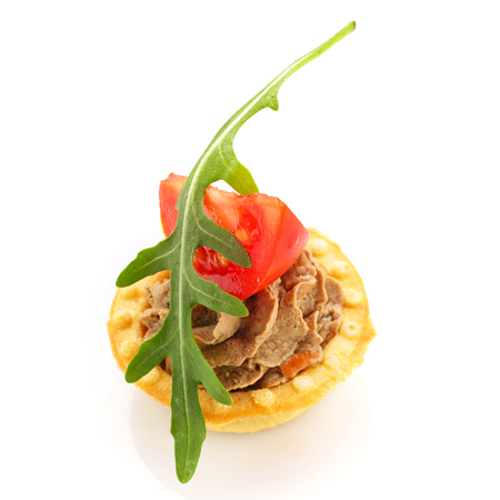 Delicious buffet,  sandwiches with pate and tomato  on  white backgroundの写真素材