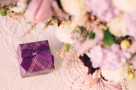 beautiful purple box for a gift in flowers, film effectの写真素材