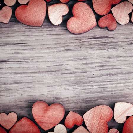 background with wooden  hearts, place for textの写真素材