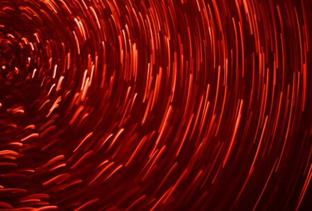 festive christmas background - shining red glitter background bokehの写真素材