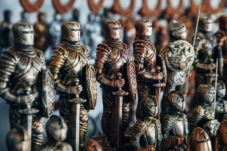 army of tin soldiers with swords and shieldsの写真素材