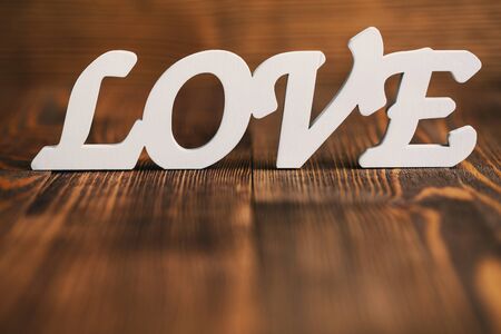 Love text on wooden background with place for text, Love valentines day backgroundの写真素材