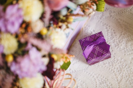 floral decoration with box for a gift, place textの写真素材