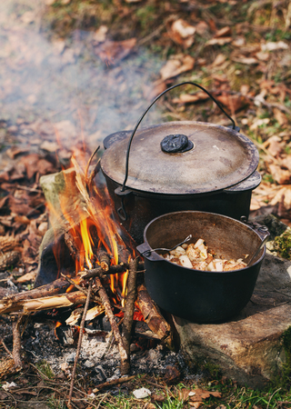 boiler with food standing on fire.の写真素材