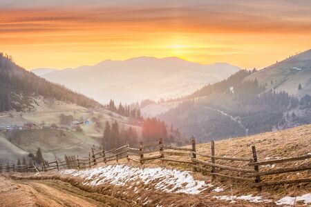 sunrise in a mountain village landscapeの写真素材