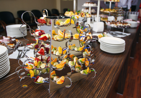 Beautifully decorated Banquet table with fresh fruit.の写真素材