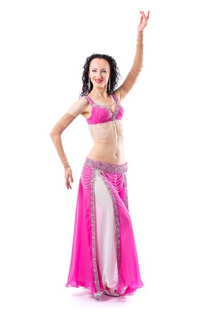 Beautiful Arabian bellydancer sexy woman in bellydance colorful costume Over white backgroundの写真素材