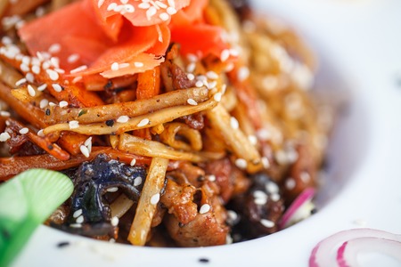 restaurant food, decor dishes chef cook - Asian style noodles with chicken and vegetablesの写真素材