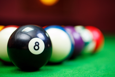 billiard balls on a green pool table, closeupの写真素材