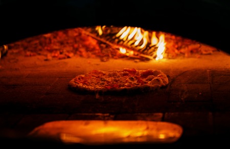 In the kitchen of chef. Master class on cooking pizzaの写真素材
