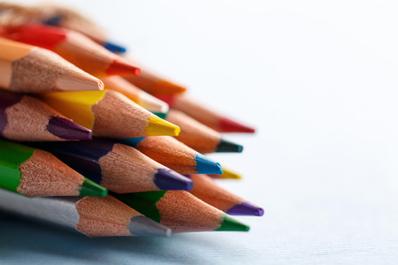 Bright color palette of crayons on the table