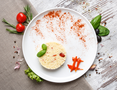 Concept promotional flyer. An original dish with decorations on a light background. Flay lay. Top viewの写真素材