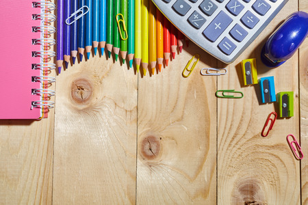 Group of school supplies and books on wooden table. Top view, flat lay. copyspaceの写真素材