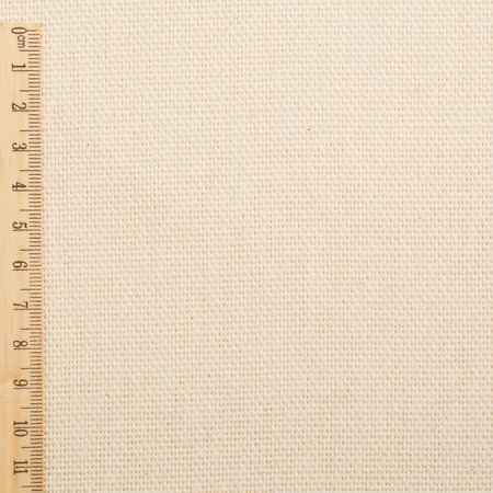 Cotton fabric in light yellow color for arts painting backdrop, sacking and bagging design.The fabric keeps the shape and easy to useの写真素材