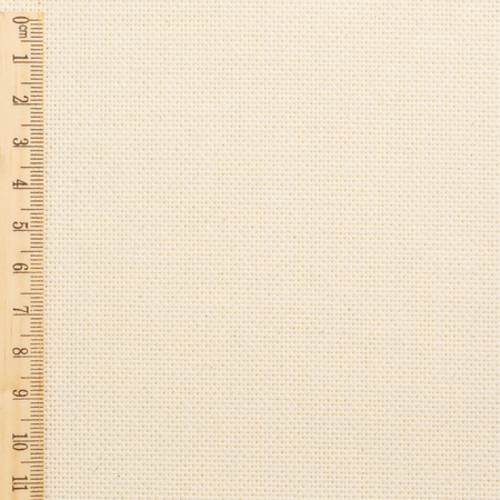 Cotton fabric in light yellow color for arts painting backdrop, sacking and bagging design.The fabric keeps the shape and easy to useの写真素材