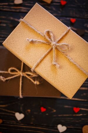Two brown gift boxes on a wooden backgroundの写真素材