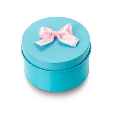 Blue gift box with white bow isolated on white. Side view. Clipping path includedの写真素材