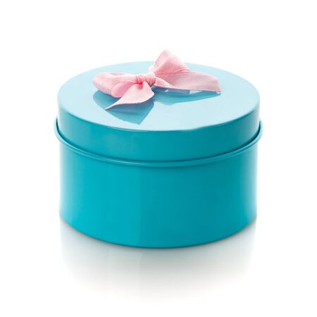 Blue gift box with pink ribbon isolateの写真素材