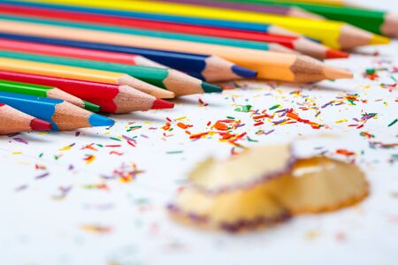 Bright color palette of crayons on the table. 1 September concept postcard, teachers day. selective focusの写真素材