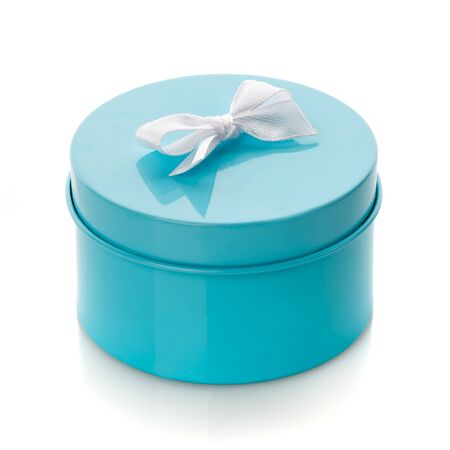 Turquoise gift box with white bow isolated on white. Side viewの写真素材