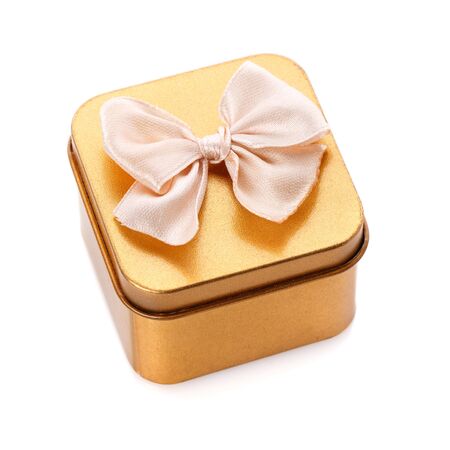 Gold gift box isolated on white backgroundの写真素材