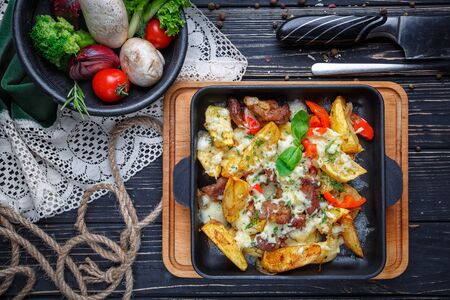 Poster for Restaurants. Baked potatoes with meat, tomatoes, greens and cheese. Along with...