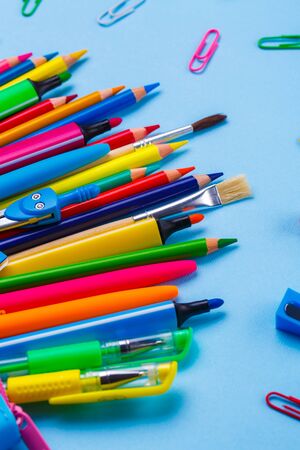 Bright background Back to School ready for your design. School objects for students. On a blue background. flat layの写真素材
