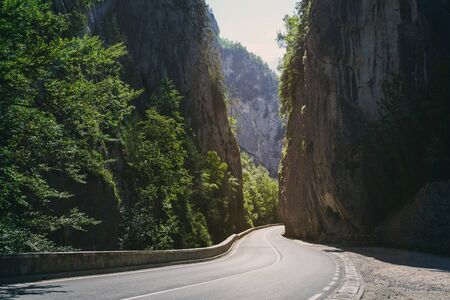 Road in the Bicaz Gorge a gorge in Cheile Bicazului-Hasmas National Park Romaniaの写真素材