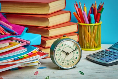 Working mess on the table in the student. School objects for students. Concept of education or back to schoolの写真素材