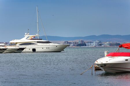 Boats are parked in the harbor. Summer seascape. Travel and Vacation Concept. Beautiful sunny day.の写真素材