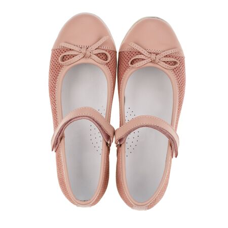 Pink sandals for girls on a white background. Photo for shoes advertisement. Kids shoos. Top viewの写真素材