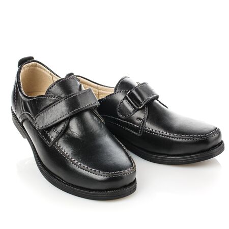 Classic leather kids shoes for boy on a white background. Photo for shoes advertisementの写真素材