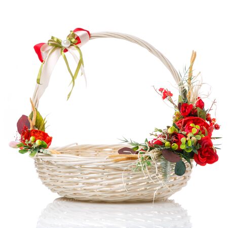 Round white basket with red decor. Easter basket. Isolatedの写真素材