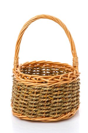 Original blank wicker basket isolated on white. Handmade.の写真素材