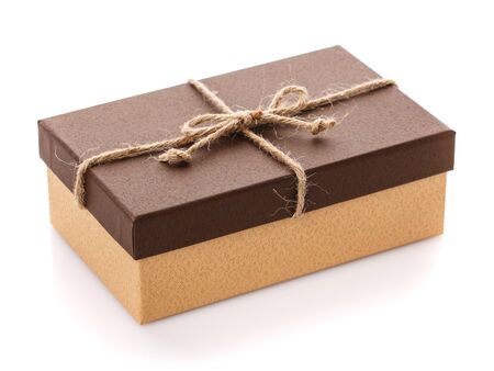 Cardboard box on a white background. Gift box with sacking ribbon.の写真素材