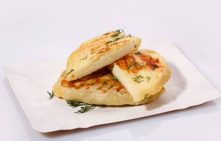 Zrazy with dill on a paper plate on a white background. National Ukrainian, Lithuanian, Polish and Belarusian cuisine. Easy meal idea.の写真素材