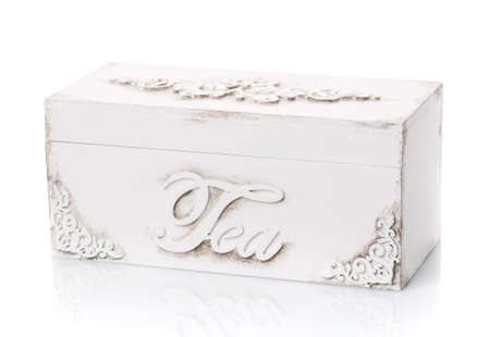 White wooden box for tea in vintage style on a white background.の写真素材