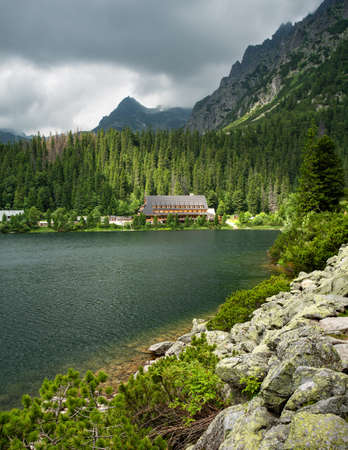 Popradske pleso near Strbske pleso in Slovakia. Beautiful Poprad lake near the rocky mountains in the High Tatras.の写真素材