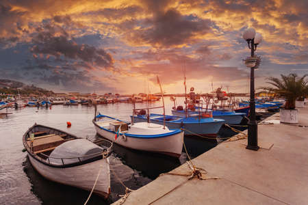 Boats parking at pier. Summer landscape. Fishing boats near the shore.の写真素材