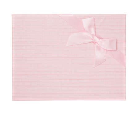 Pink festive gift box with pink bow on white background. Top view.の写真素材