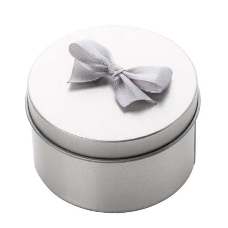 Round metallic gift box in gray with a small ribbon for a mini gift. Isolated on white backgroundの写真素材