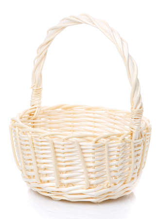 Beautiful handmade wicker basket isolated on white. Side view.の写真素材
