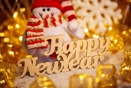 Happy New Year wooden text. Christmas holiday season toy.の写真素材