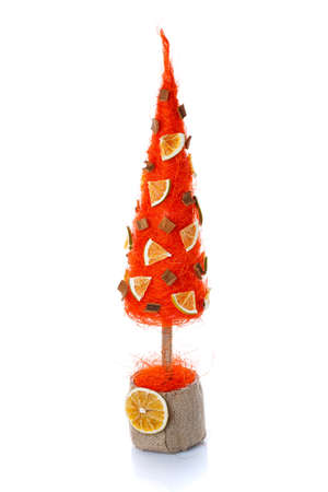 Decorative Christmas tree for home interior or office on a white backgroundの写真素材