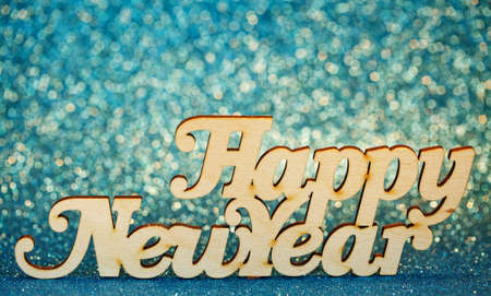 Happy new year text on an abstract bokehの写真素材