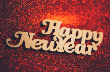 Happy new year text on an abstract bokehの写真素材