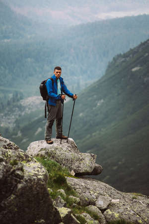 Man Traveler on mountain summit enjoying aerial view. Slovakia, Europe.の写真素材