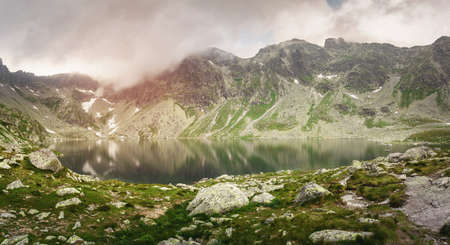 Panoramic view of Hincovo pleso with mountains in the background in Slovakia.の写真素材