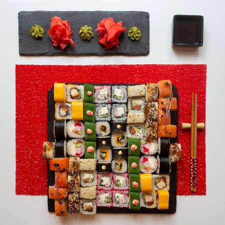 Set of sushi from many types of roles and with different stuffing. Sushi menu. Japanese gourmet sushi.の写真素材